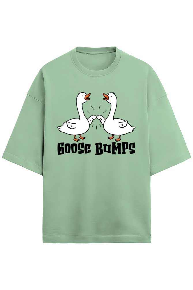 Unisex oversized light blue t-shirt made with 280 GSM French Terry fabric featuring a cartoon graphic of two geese fist bumping with the text “Goose Bumps”