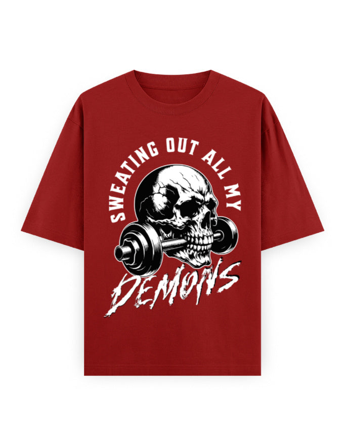 Red t-shirt with a skull and barbell graphic and text on a white background