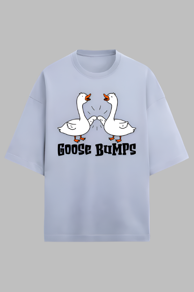 Unisex oversized light blue t-shirt made with 280 GSM French Terry fabric featuring a cartoon graphic of two geese fist bumping with the text “Goose Bumps”