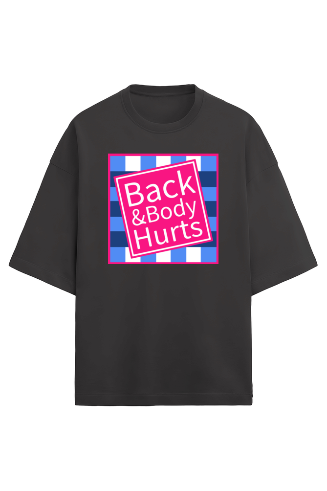 black unisex oversized French Terry T-shirt in 280 GSM cotton featuring a humorous pink and blue square graphic with the text “Back & Body Hurts”