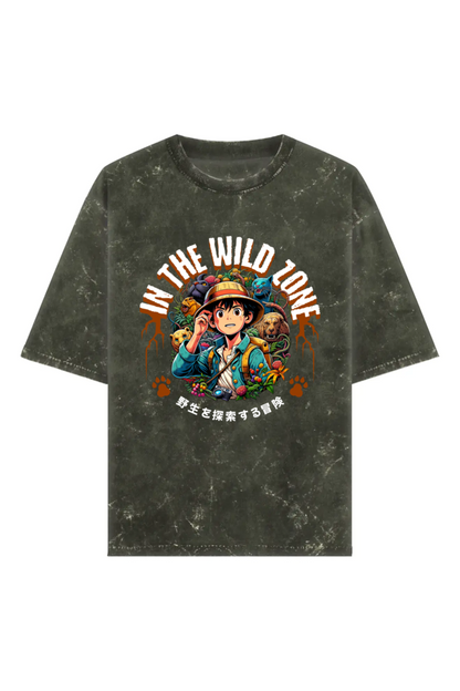 Acid washed unisex oversized  t-shirt with anime-style jungle explorer print and “In The Wild Zone” text, 240 GSM heavyweight 100% cotton.