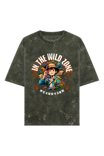 Acid washed unisex oversized  t-shirt with anime-style jungle explorer print and “In The Wild Zone” text, 240 GSM heavyweight 100% cotton.