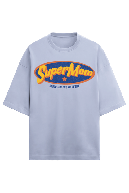 Lavender oversized women’s T-shirt in 280 GSM French Terry cotton with a retro comic-style “SuperMom” print and the phrase “Saving the Day, Every Day”