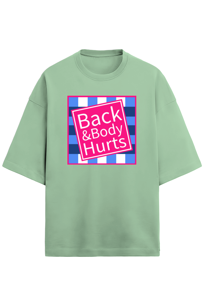 jade green unisex oversized French Terry T-shirt in 280 GSM cotton featuring a humorous pink and blue square graphic with the text “Back & Body Hurts”