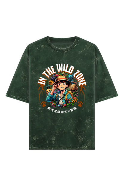 Acid washed unisex oversized  t-shirt with anime-style jungle explorer print and “In The Wild Zone” text, 240 GSM heavyweight 100% cotton.