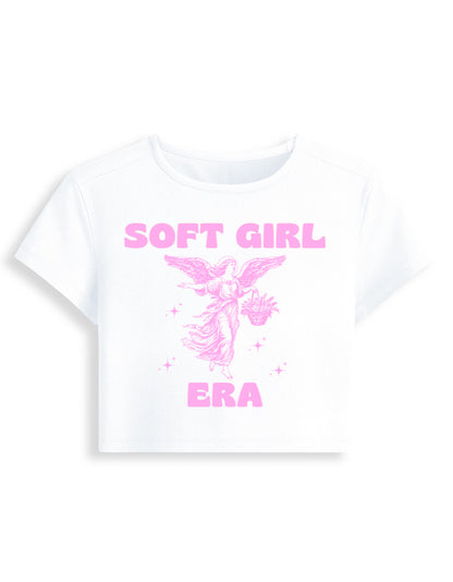 White t-shirt with pink 'SOFT GIRL ERA' text and graphic on a white background