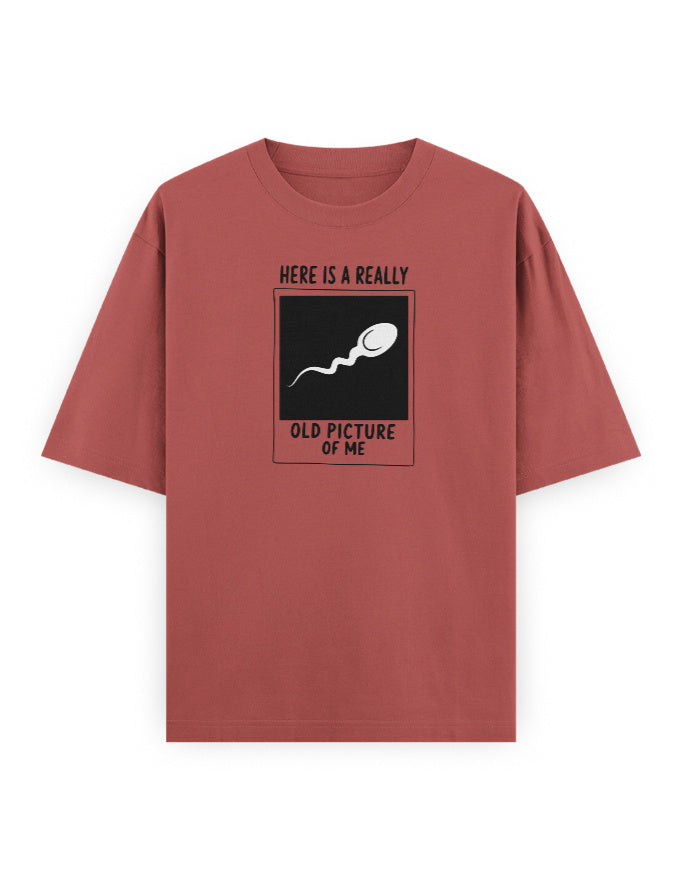 Color_Coral. Funny oversized t-shirt with Here Is a Really Old Picture of Me graphic by Frolic Saga