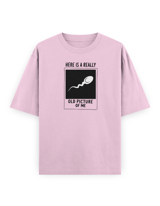 Color_LightBabyPink. Funny oversized t-shirt with Here Is a Really Old Picture of Me graphic by Frolic Saga