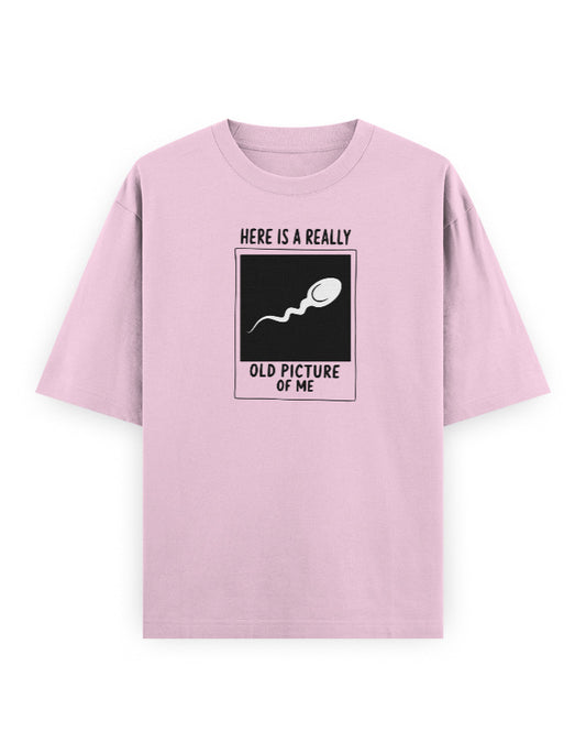 Color_LightBabyPink. Funny oversized t-shirt with Here Is a Really Old Picture of Me graphic by Frolic Saga