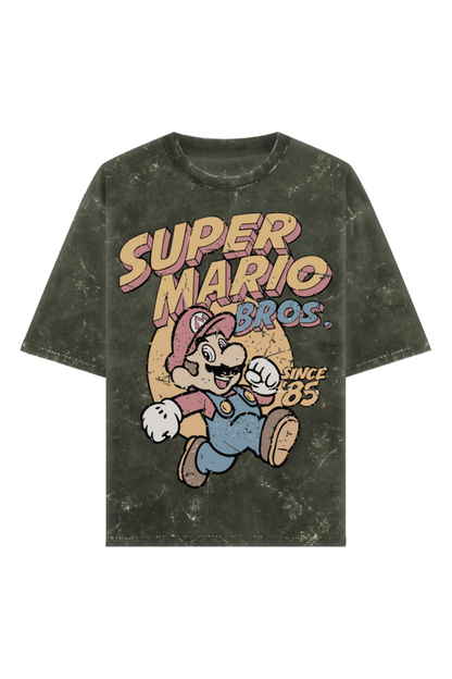 Unisex acid washed olive green oversized T-shirt with vintage Super Mario Bros graphic and “Since ‘85” text, made from 240 GSM 100% cotton