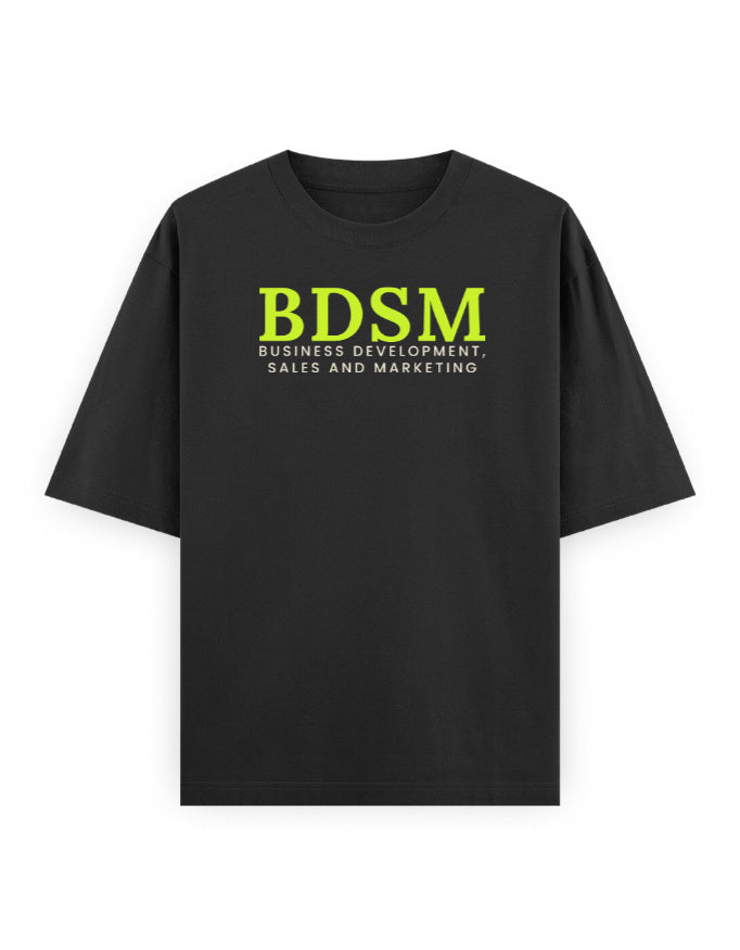 BDSM Business Development, Sales and Marketing black oversized tee, front neon green typography print - Frolic Saga