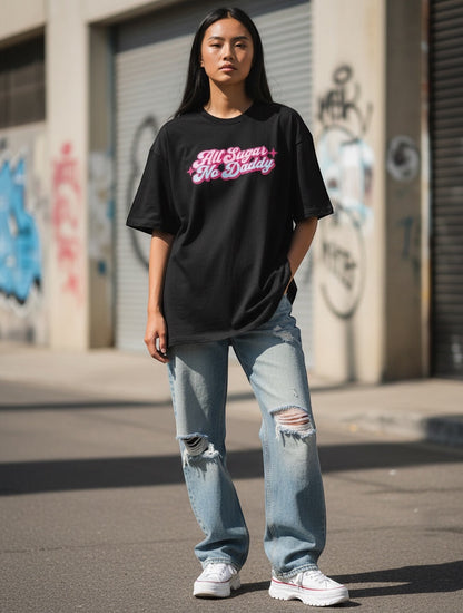 Frolic Saga black oversized t-shirt with "All Sugar No Daddy" Y2K graphic in pink and blue. 100% cotton.