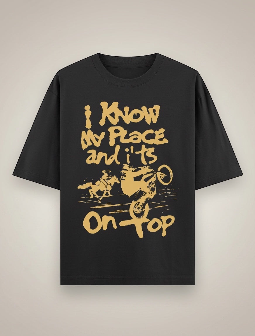 Frolic Saga black 100% cotton oversized t-shirt with graphic print of a motocross rider and horse.