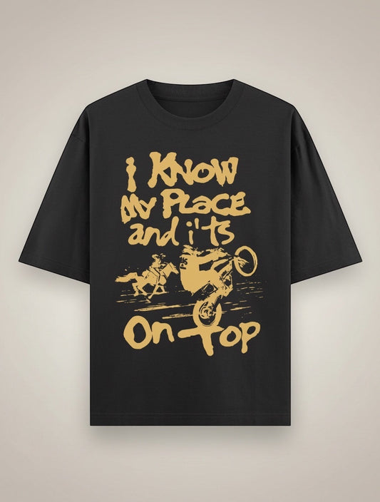Frolic Saga black 100% cotton oversized t-shirt with graphic print of a motocross rider and horse.
