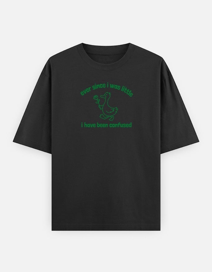 Frolic Saga black oversized cotton t-shirt with green graphic of a duck holding a rose and text "ever since i was little i have been confused."