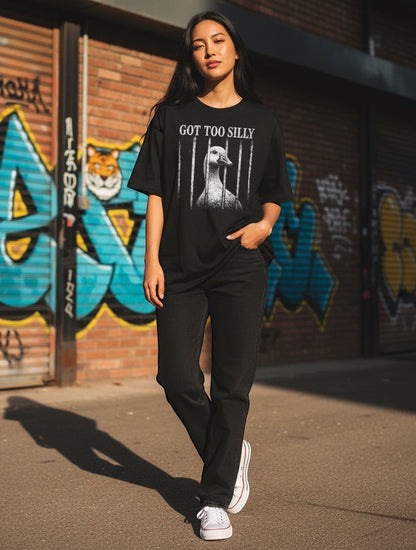 Frolic Saga black 100% cotton oversized t-shirt with a graphic of a goose behind bars and the text "GOT TOO SILLY".