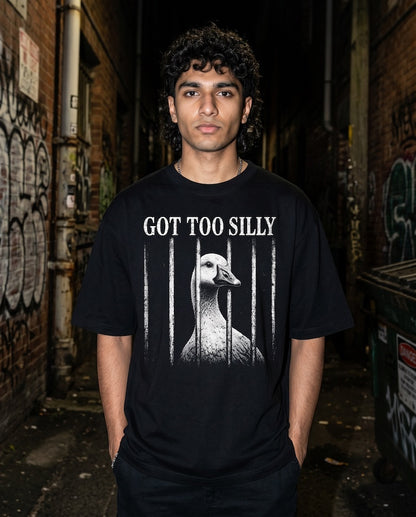 Frolic Saga black 100% cotton oversized t-shirt with a graphic print of a goose behind bars and the text "GOT TOO SILLY".