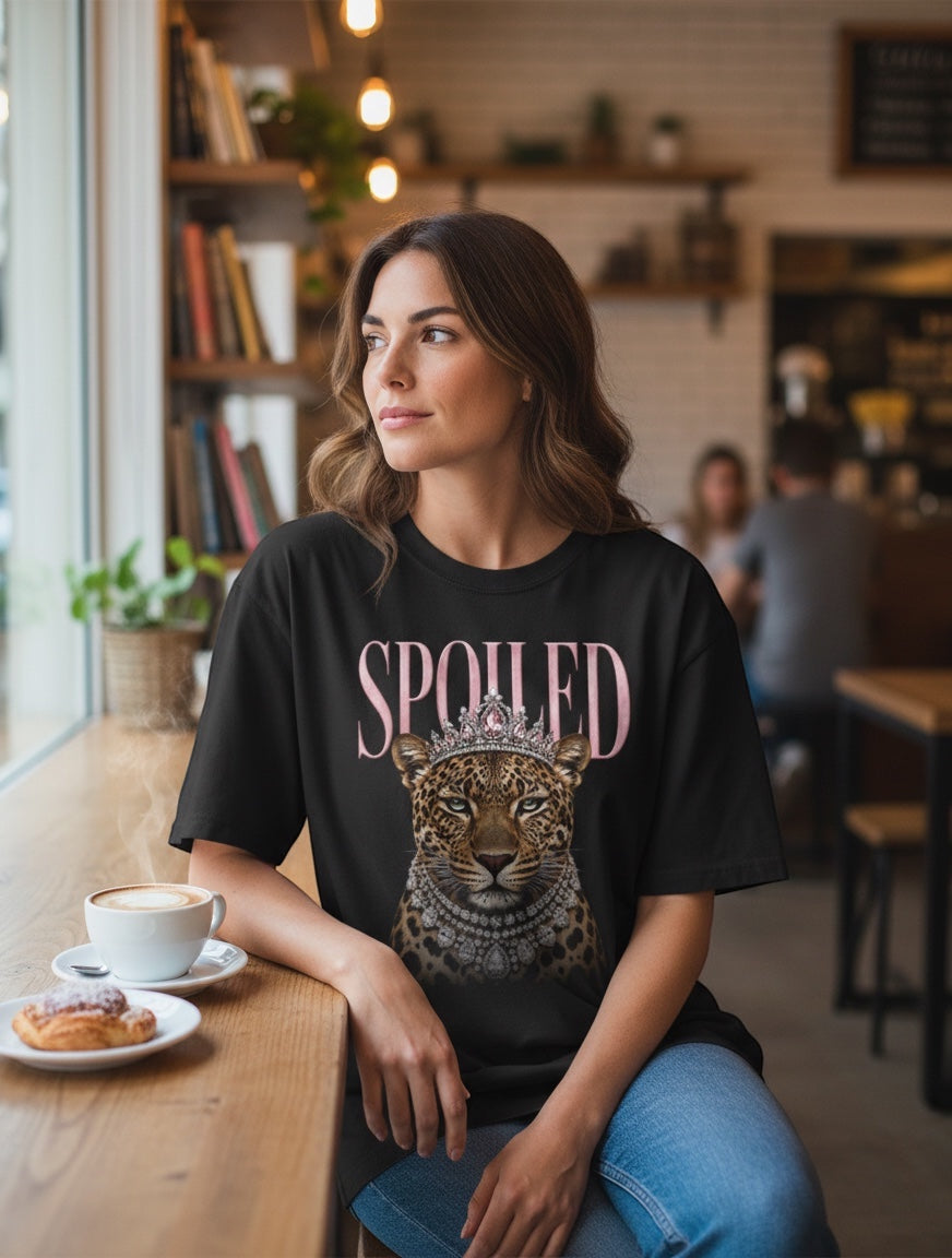 Frolic Saga black 100% cotton oversized t-shirt with a leopard wearing a crown and jewels, and the word "SPOILED" above.