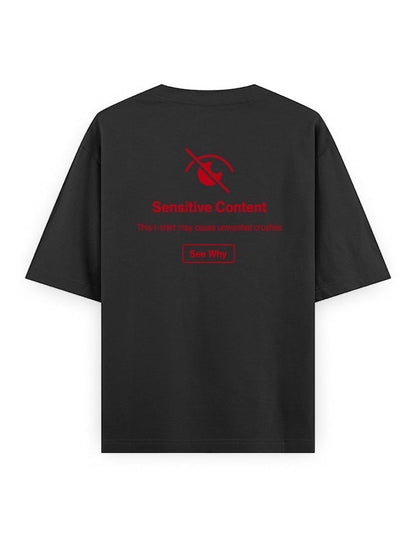 Frolic Saga black 100% cotton oversized t-shirt with red 'Sensitive Content' graphic and 'See Why' button.