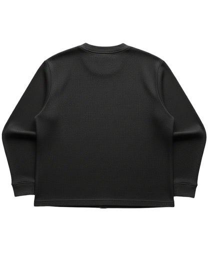 Black waffle knit oversized full sleeve tee, back view - Frolic Saga Bare Minimum