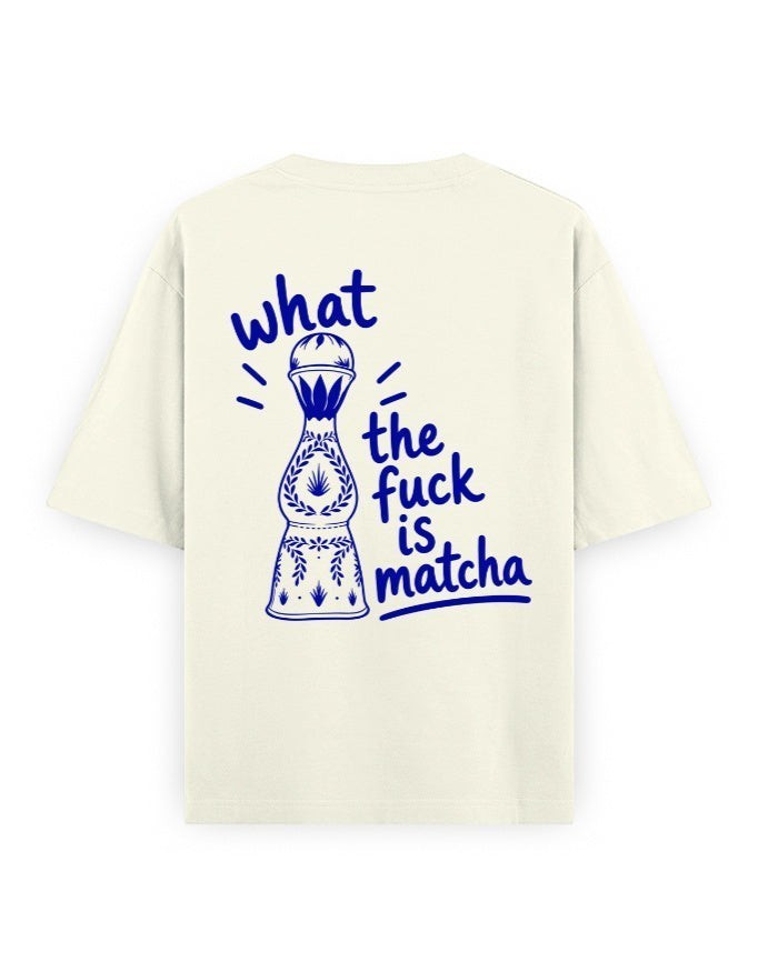 Frolic Saga unisex oversized cream cotton t-shirt with blue graphic print of a bottle and text on the back