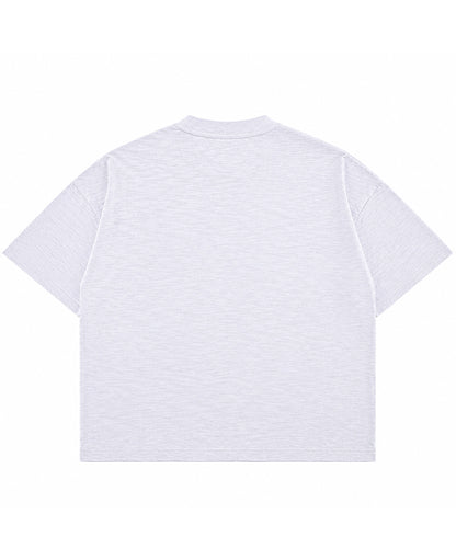 Dust white boxy slub tee, back view - Frolic Saga Bare Minimum