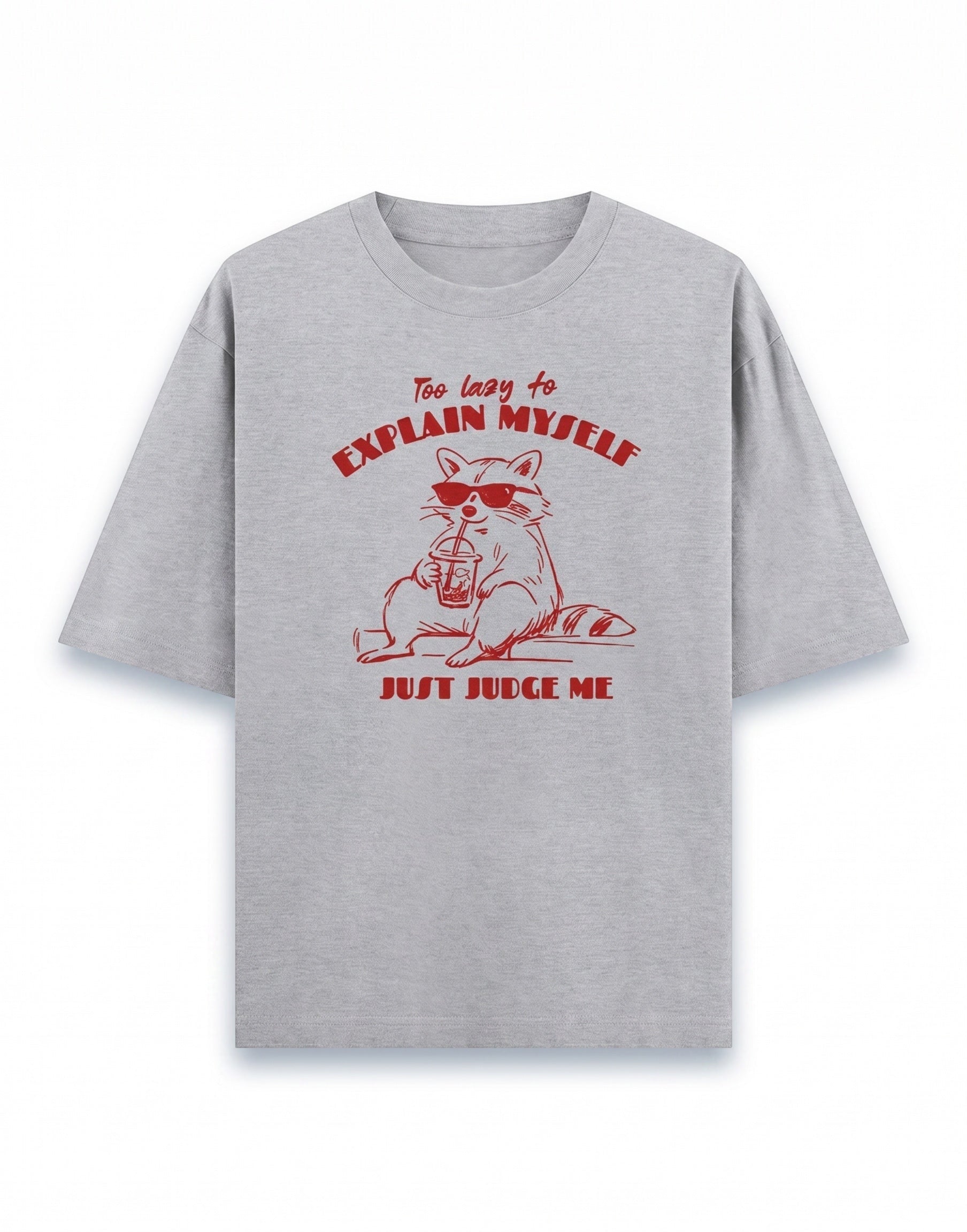 Frolic Saga grey 100% cotton oversized t-shirt with a red graphic of a raccoon wearing sunglasses and holding a drink, text reads "Too lazy to explain myself, JUST JUDGE ME."