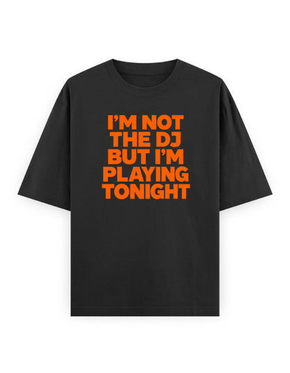 I'm Not The DJ But I'm Playing Tonight black oversized tee, front bold orange typography print - Frolic Saga