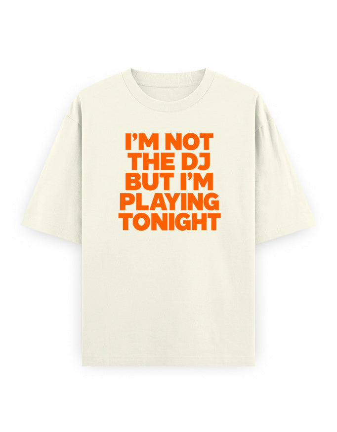 I'm Not The DJ But I'm Playing Tonight off white oversized tee, front bold orange typography print - Frolic Saga