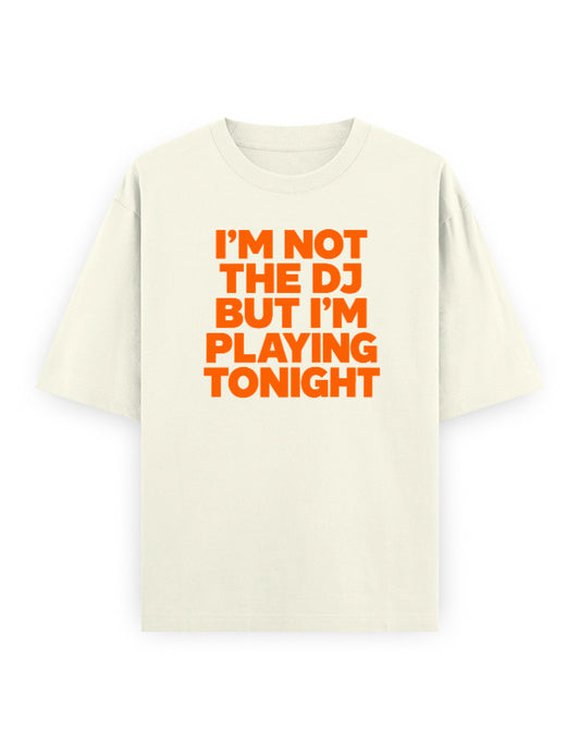 I'm Not The DJ But I'm Playing Tonight off white oversized tee, front bold orange typography print - Frolic Saga