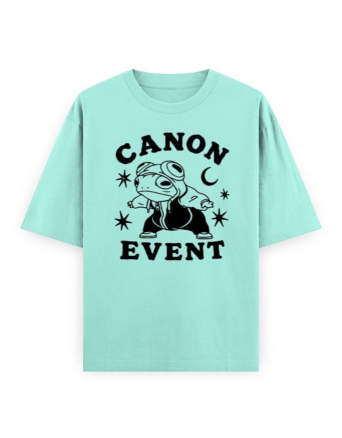 Frolic Saga Unisex oversized classic t-shirt in mint green, 100% cotton with a graphic print of a frog wearing goggles and a hoodie.