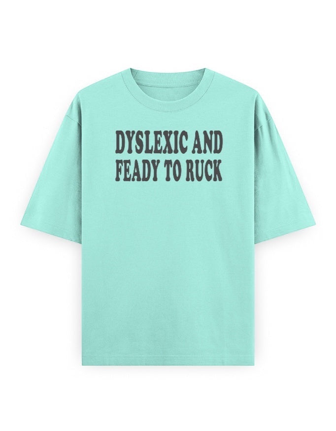 Frolic Saga unisex oversized classic t-shirt in mint green 100% cotton with 'DYSLEXIC AND FEADY TO RUCK' graphic text.