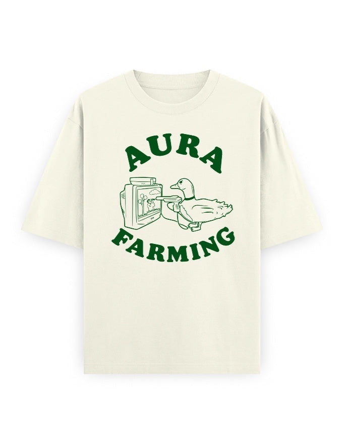 Frolic Saga Unisex oversized classic t-shirt in cream, 100% cotton with a green graphic of a duck and TV.
