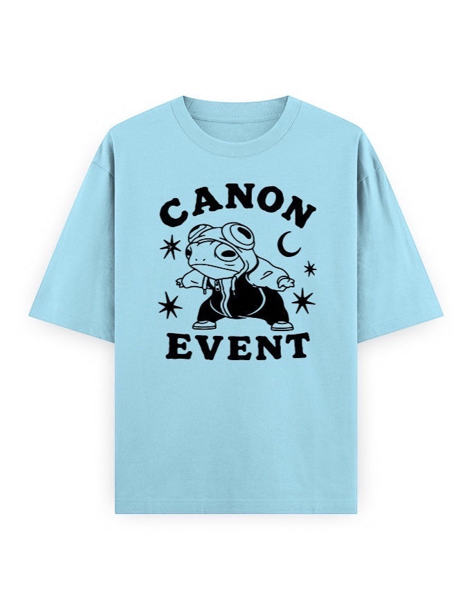 Frolic Saga Unisex oversized classic t-shirt in light blue, 100% cotton with a graphic print of a frog wearing a hoodie and goggles.