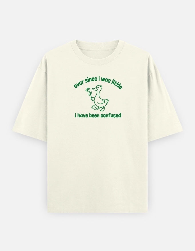 Frolic Saga off-white oversized cotton t-shirt with green line-drawn duck holding a rose and text "ever since i was little i have been confused."