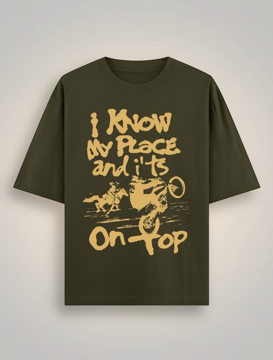 Frolic Saga Unisex oversized classic t-shirt in olive green, 100% cotton with a graphic print.