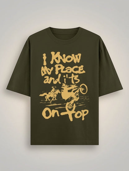 Frolic Saga Unisex oversized classic t-shirt in olive green, 100% cotton with a graphic print.