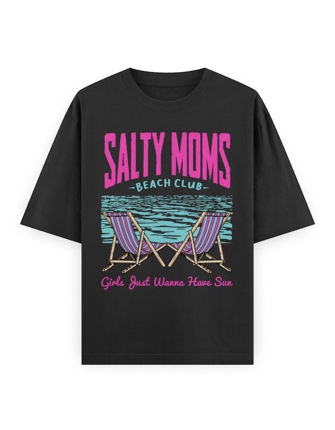 Frolic Saga black oversized cotton tee with retro Salty Moms Beach Club graphic and neon pink/teal text.