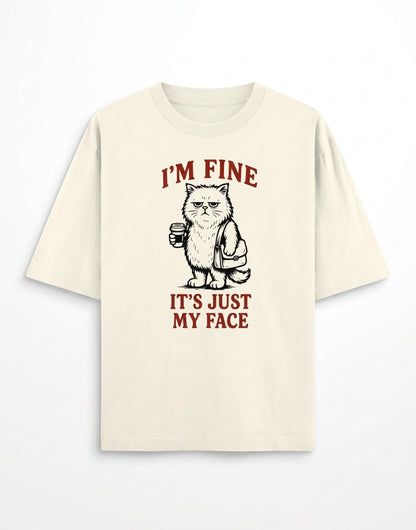 Frolic Saga cream oversized cotton t-shirt with a grumpy cat graphic and I'm Fine It's Just My Face text print.