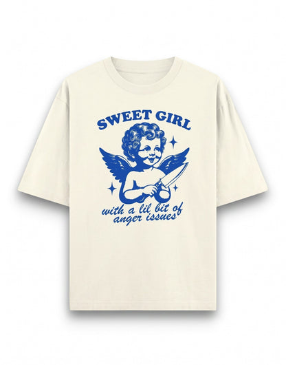 Frolic Saga cream heavyweight cotton unisex oversized t-shirt with blue graphic of a cherub holding a knife.
