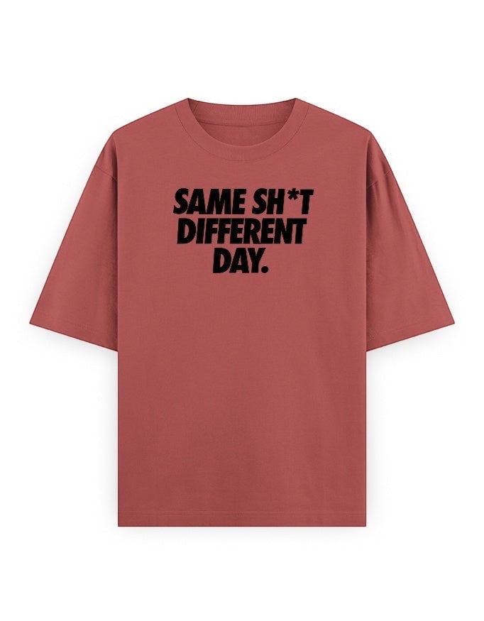 Frolic Saga Unisex oversized classic t-shirt in rust red, 100% cotton with bold black text graphic.
