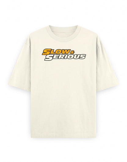 Frolic Saga unisex oversized cream cotton t-shirt with Slow & Serious graphic print on chest
