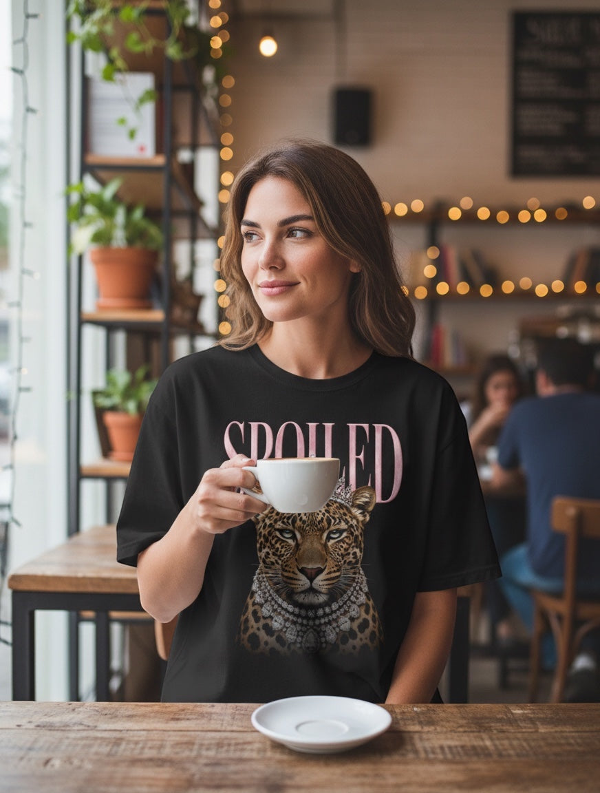 Frolic Saga black 100% cotton oversized t-shirt with a leopard graphic wearing a crown and jewels, and the word "SPOILED" in pink.