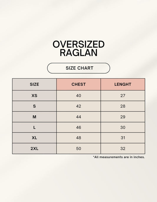 Frolic Saga unisex oversized raglan size chart with chest and length measurements in inches for sizes XS to 2XL