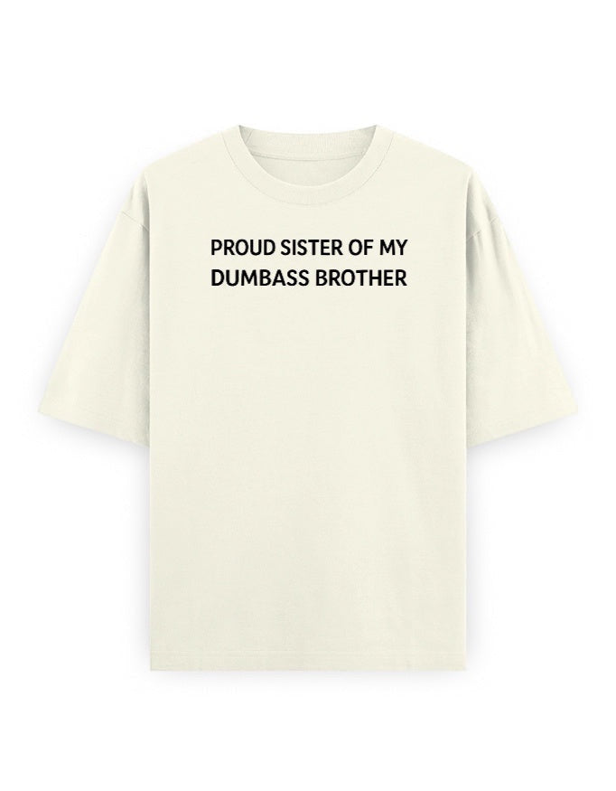 Frolic Saga cream oversized 100% cotton t-shirt with black text reading "Proud Sister Of My Dumbass Brother".