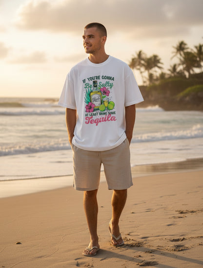 Frolic Saga white 100% cotton oversized tee with "If You're Gonna Be Salty, Bring Tequila" graphic.