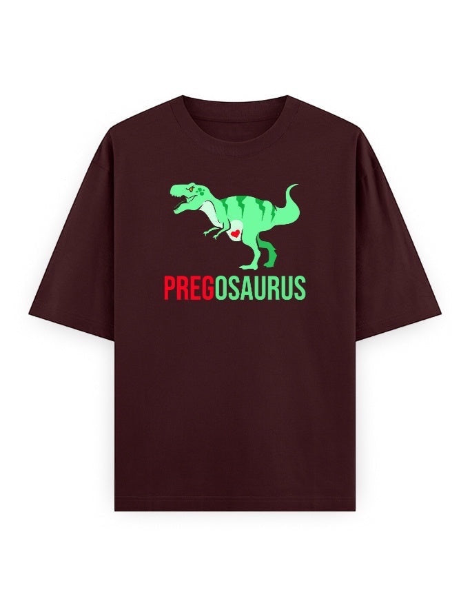 Frolic Saga unisex oversized maroon t-shirt with a green T-Rex graphic and "PREGOSAURUS" text. 100% cotton.