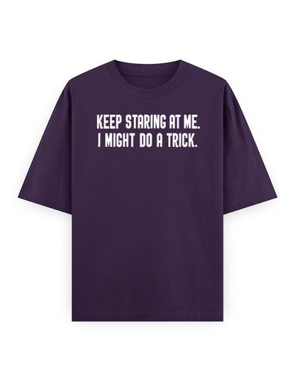 Frolic Saga Unisex oversized classic t-shirt in deep purple, 100% cotton with white text graphic "KEEP STARING AT ME. I MIGHT DO A TRICK."