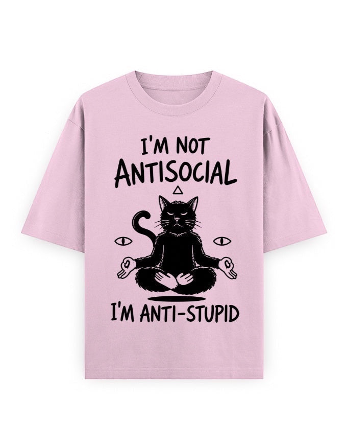 Frolic Saga unisex oversized pink 100% cotton t-shirt with a black graphic of a meditating cat and text that reads "I'm not antisocial, I'm anti-stupid."