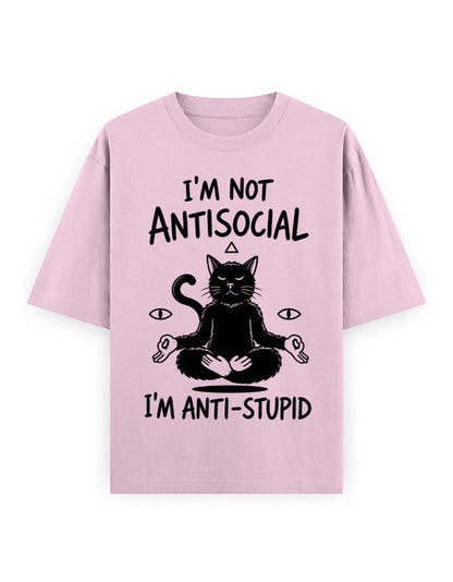 Frolic Saga unisex oversized pink 100% cotton t-shirt with a black graphic of a meditating cat and text that reads "I'm not antisocial, I'm anti-stupid."